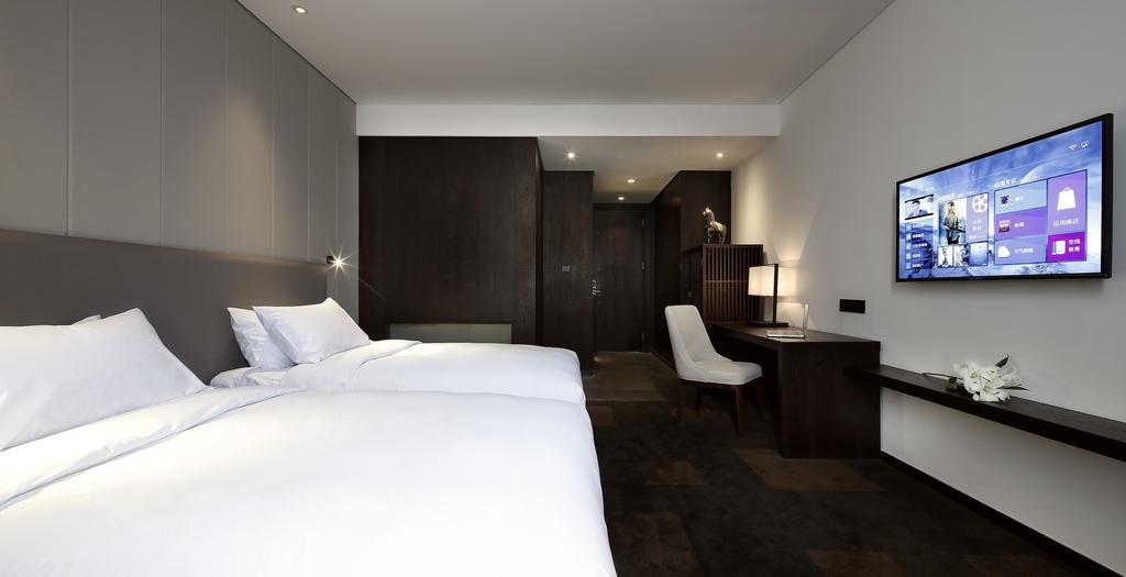 Ease House Luoyang Hotell Luoyang  Rum bild